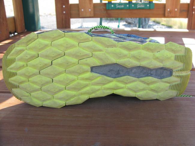 Unique outsole design with thick PWRTRAC blown rubber that works well in many different conditions. Thickness helps with cushion, but contributes to heaviness.